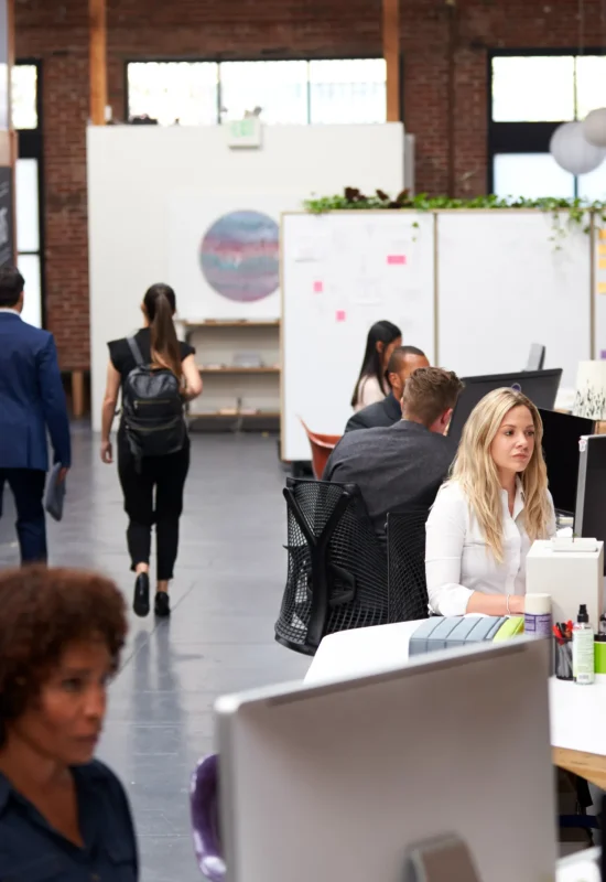 business-team-working-at-desks-in-modern-open-plan-2024-10-19-11-08-51-utc